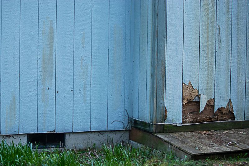 Batten Siding Before Repairs